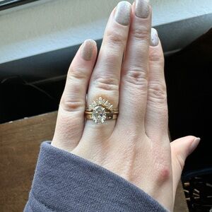 Moissanite wedding band in 14k gold